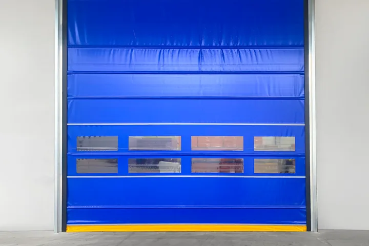Blue heavy-duty rapid roller door with vision panels