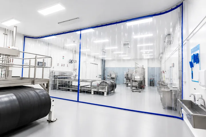 Transparent PVC curtain wall partitioning in a warehouse